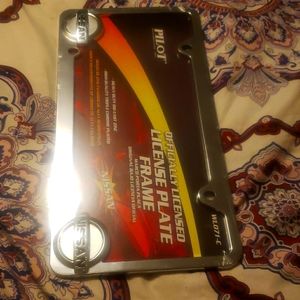 NEW NISSAN LICENSE PLATE HOLDER
